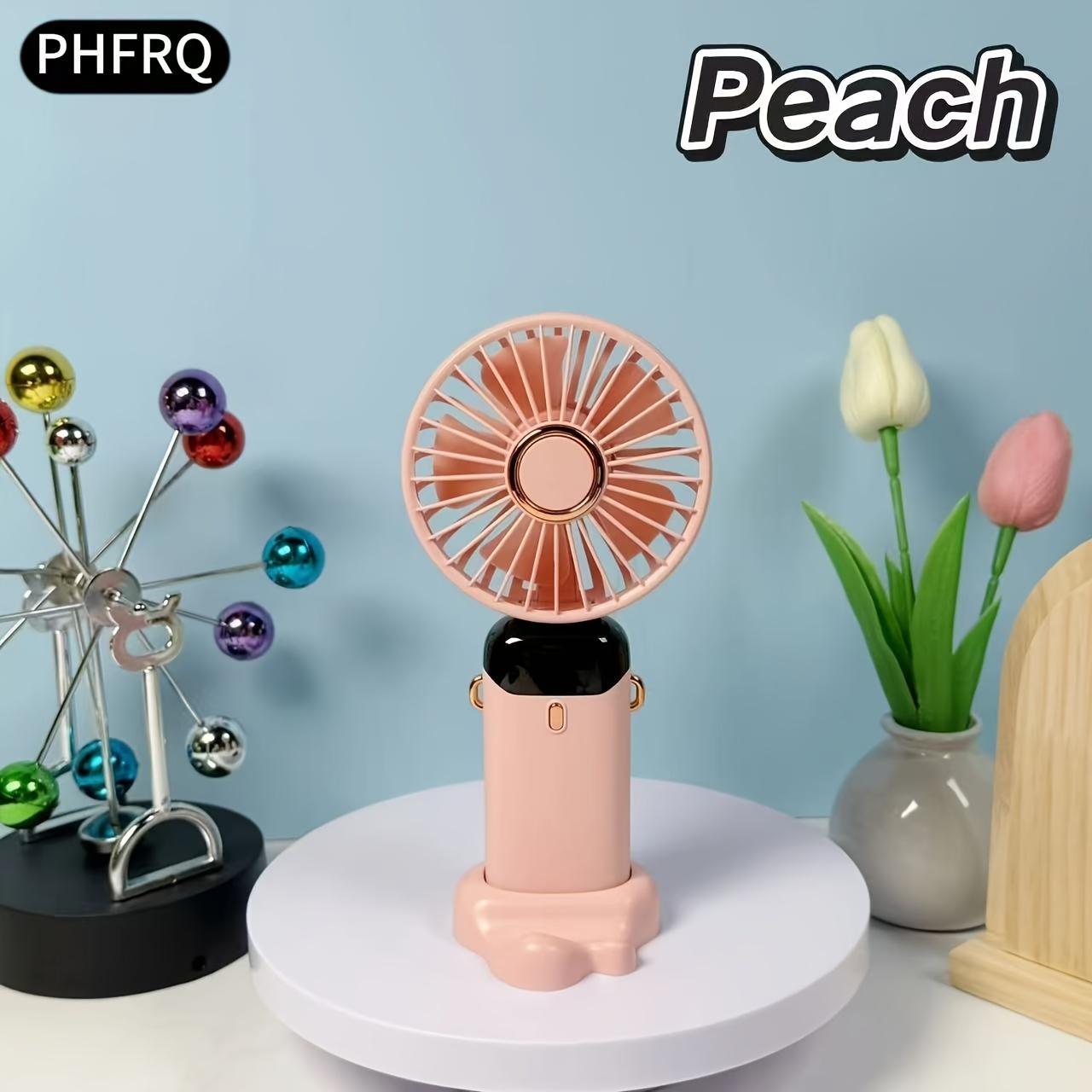 

Portable USB Rechargeable Fan Features 5 Speed Settings, Adjustable Wind Speed, and a Digital Display. It Can Be Used Handheld, Neckband персиковый