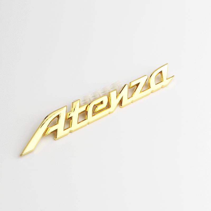 

Індивідуальні англійські металеві наклейки для логотипів автомобіля Mazda Atenza золотий