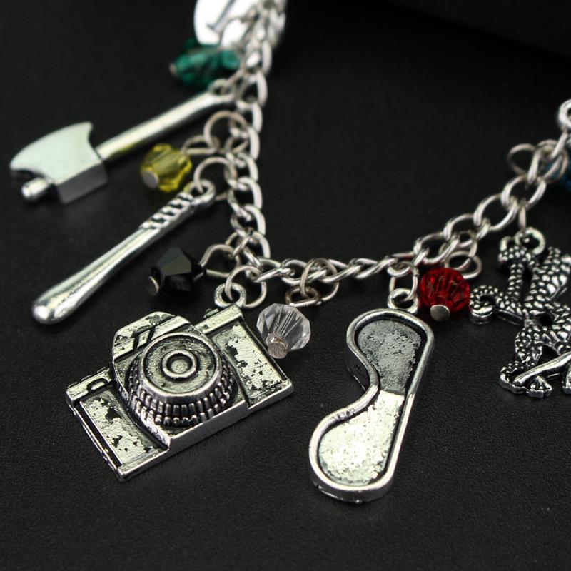 Stranger Things Multi-Accessory Jewelry Set: Bracelet, Axe, Cassette, Bicycle Theme