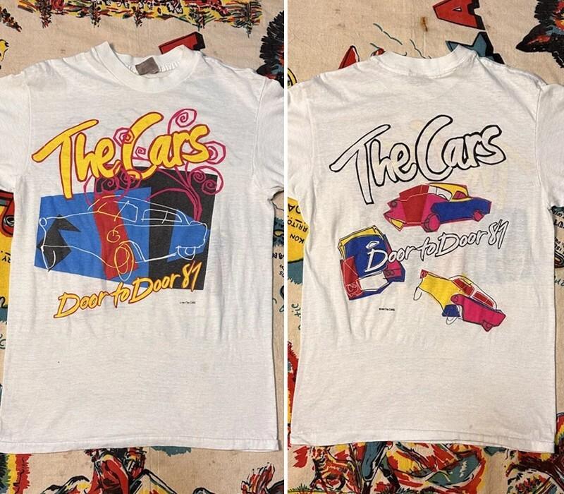 

Футболка с принтом группы The Cars 1987 Door To Door Tour Двусторонняя футболка Унисекс S