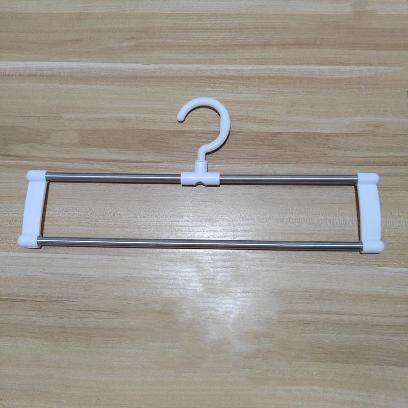 

Многослойная вешалка для брюк из нержавеющей стали – Многофункциональная складная вешалка с прищепками, не оставляющая следов, для подвешивания и организации брюк.