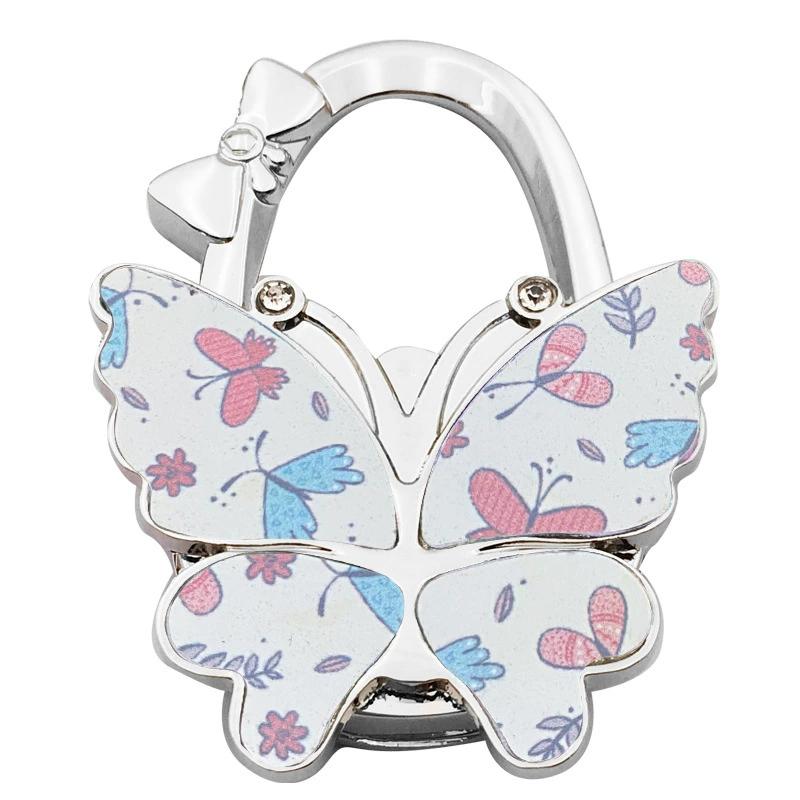 

Portable Butterfly- Bowknot Table Bag Hook Multifunction Folding Ladies Bag Buckle Handbag Hook For Bag Hanging as the picture