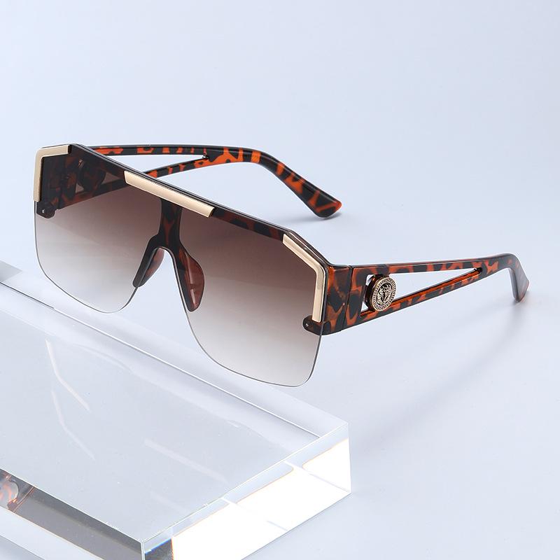

Trendy One-Piece Lens Sunglasses: European & American Sports Style Hollow Goggles