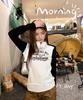 2026 Spring/Summer Women's Black & White Patchwork Raglan Long Sleeve Tee - American Style Print, Loose Fit, Color Block Trendy Top
