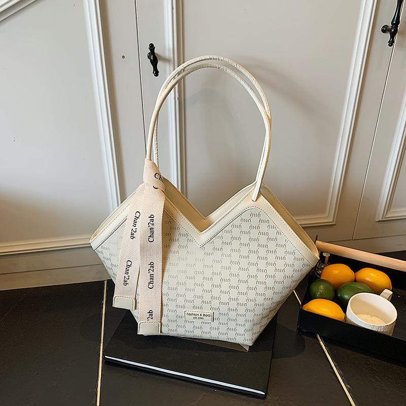 

Женская сумка 2025 новая высококлассная универсальная сумка через плечо большая сумка-тоут модная сумка для通勤 42*10.5*30 белый