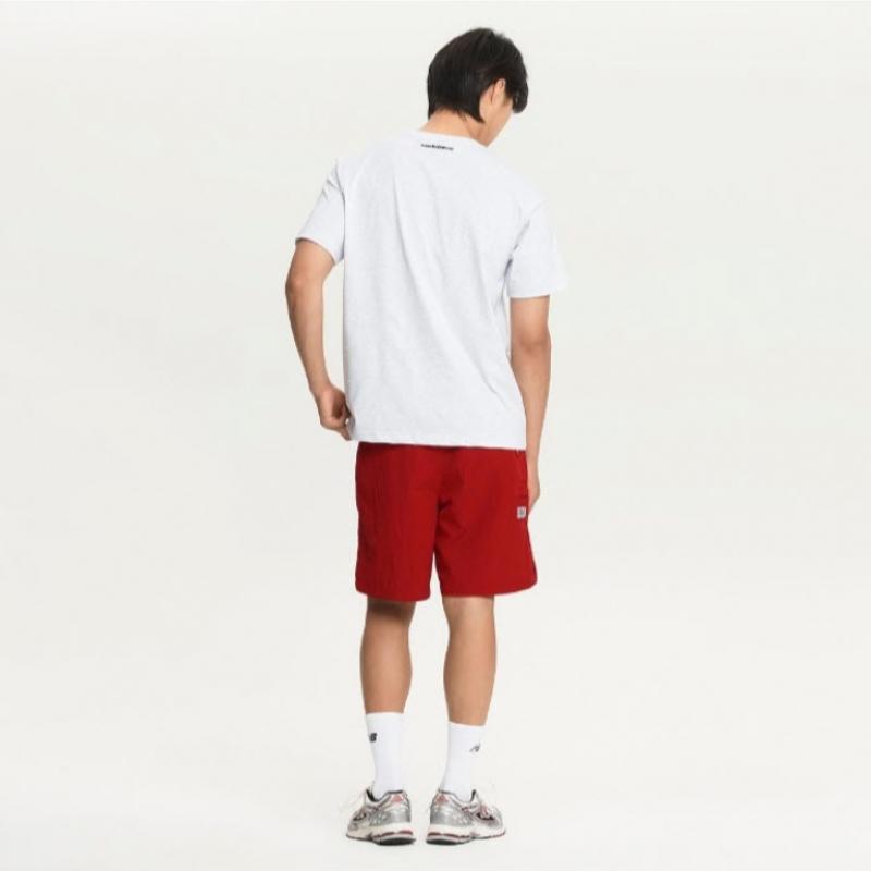 New Balance Tee Kqj Nbnee21013 16 Common Essential Small Logo Short Sleeve Tee  Stan