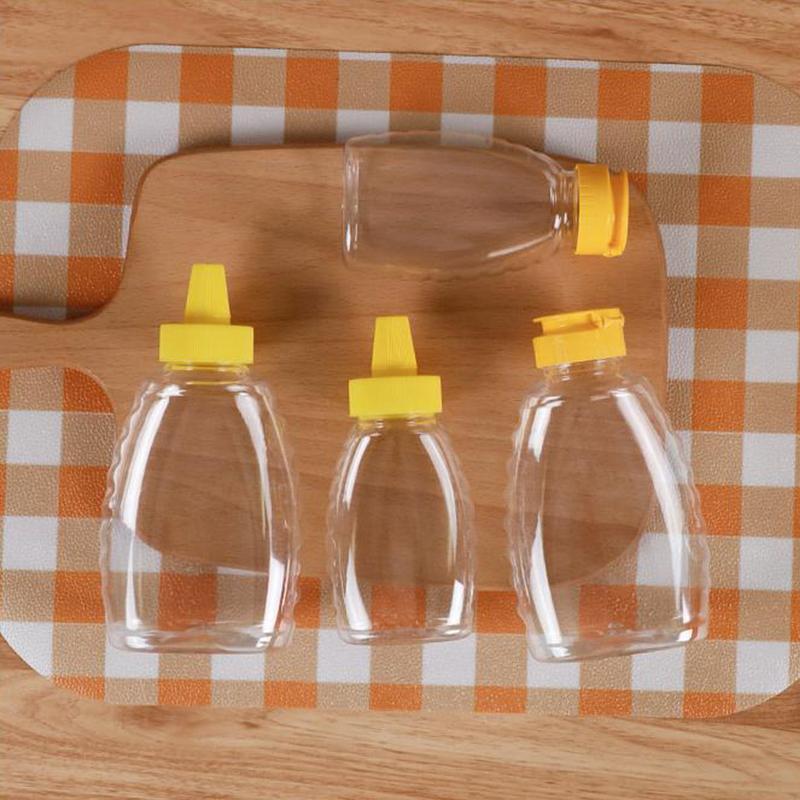 Transparent Reusable Plastic Honey Bottles Squeeze Honey Bottle Container Holder With Lid For Storing And Dispensing Honey Jar