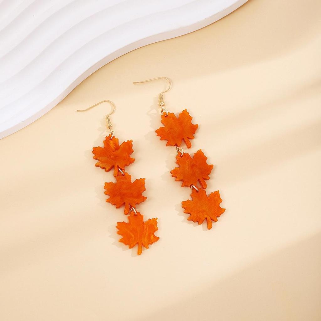 Elegant Maple Leaf Tassel Earrings - Red Acrylic Dangles for a Face-Slimming Effect