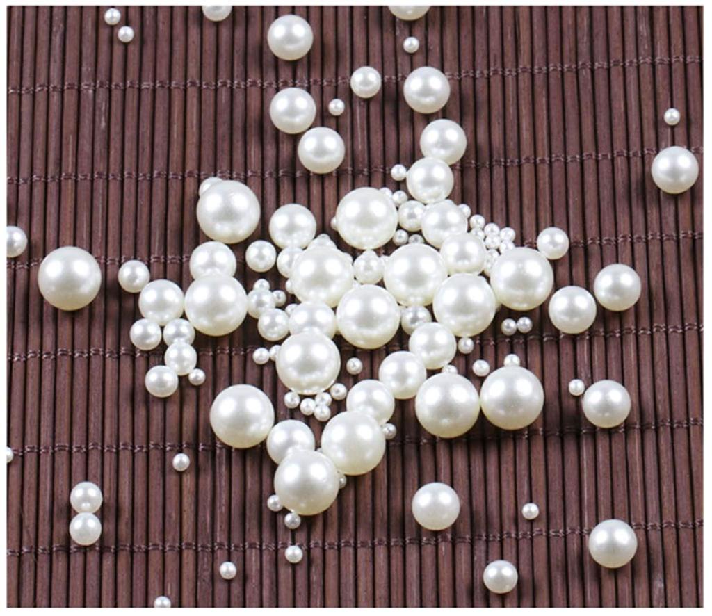 Flower and Pearl Set In a Box A Set of Commonly Used Flower and Pearl Sizes A Set of Two Flower Sizes / /