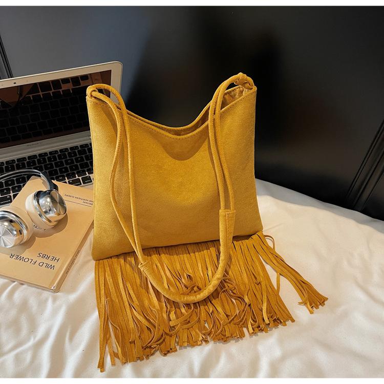 

2025 new retro niche western bohemian suede fringed bag single shoulder underarm women s bag oblique span bag tide жёлтый