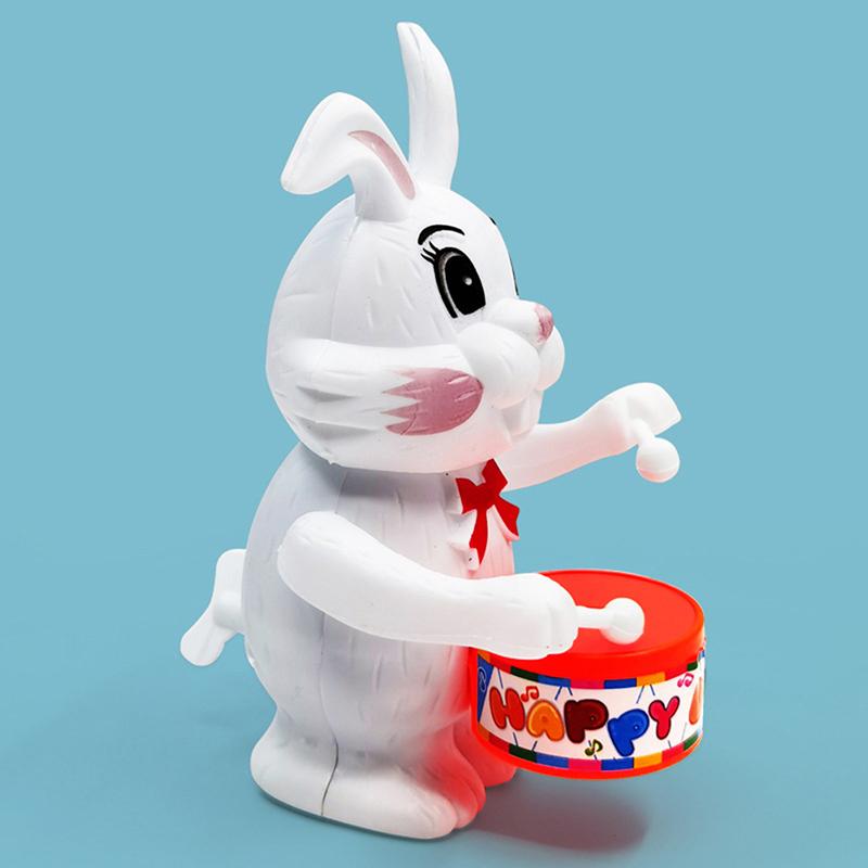 1Pc Tamburo a carica Coniglio Giocattolo per bambini Orologio Tamburo Coniglio Puzzle Tamburo Cartone animato Coniglio