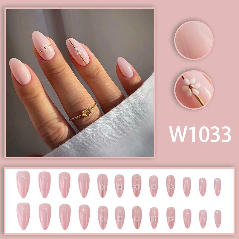 Elegant Girly Pink Almond Nails with Gold Thread and Small Flower Design