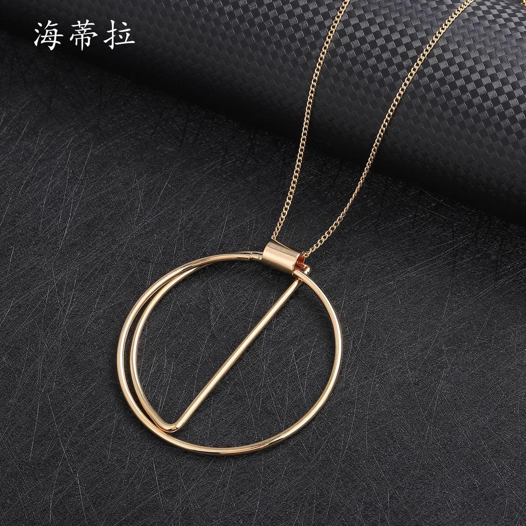 New Gold Hollow Ring Pendant, Fashionable and Simple Women's High-end Long Banquet Sweater Chain