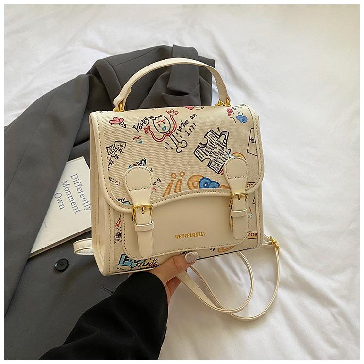 Korean version of college style cute cartoon handbag women 2025 new fashion casual simple backpack student schoolbag
