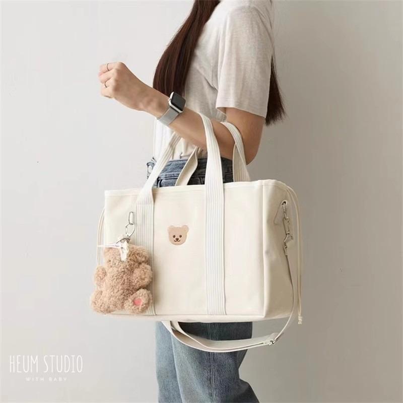 

Korean ins style cartoon cute bear mommy bag is convenient for going out and multi-functional portable shoulder bag storage bag білий