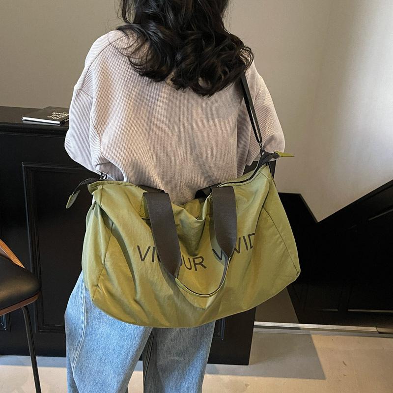 Business trip short trip bag women's lightweight solid color fitness bag fashion shoulder sports bag men's portable storage duffel bag