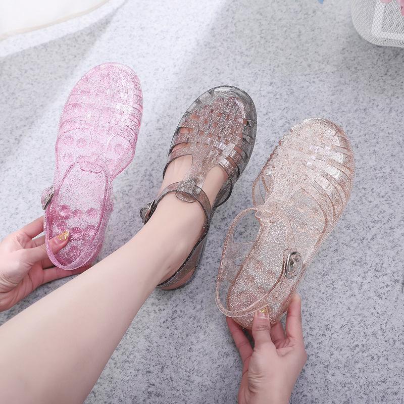 

Baotou sandals women s transparent solid color hole shoes spring and summer new casual outer wear hollow breathable flat sandals 40 рожевий