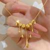 Light Luxury Fashion Water Drop Cat Eye Fringed Necklace Women'S Simple And Versatile Gold Flash Dancing Di Bead Spirit Dynamic Necklace