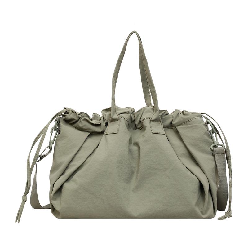 Einfarbige Kordelzug-Handtasche Damen-Schultertasche Große Kapazität Pendler-Crossbody-Tasche