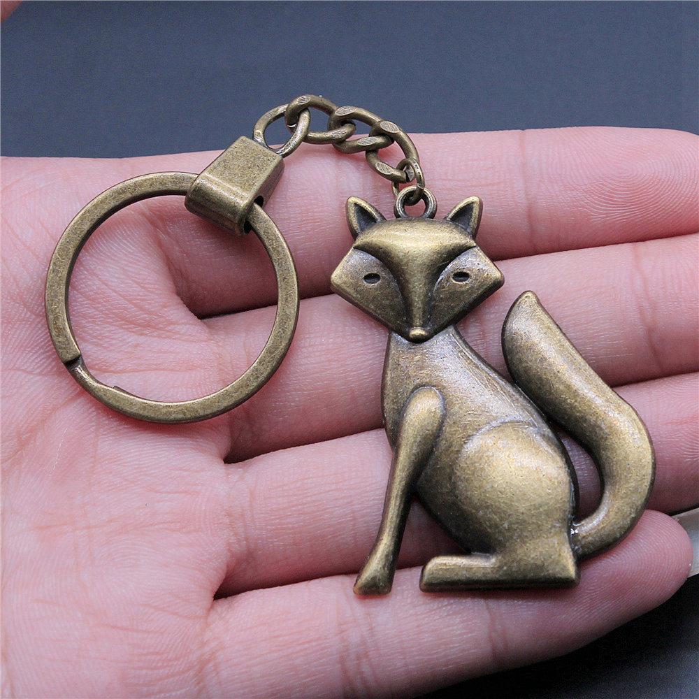 Dinosaur Animal Prehistoric Creature Pendant Antique Bronze Metal Keychain with 30mm Ring for Women High Quality