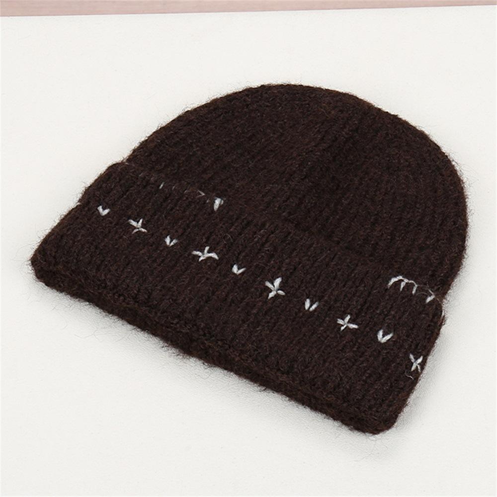 Autumn and winter simple small line knitted hat women's autumn and winter warm wool hat showing face small cold hat men and women