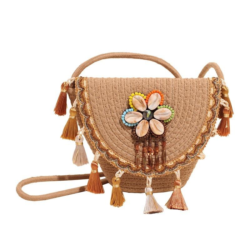 Summer vacation handwoven bag new fashion fringed beach shoulder messenger bag women's bucket bag