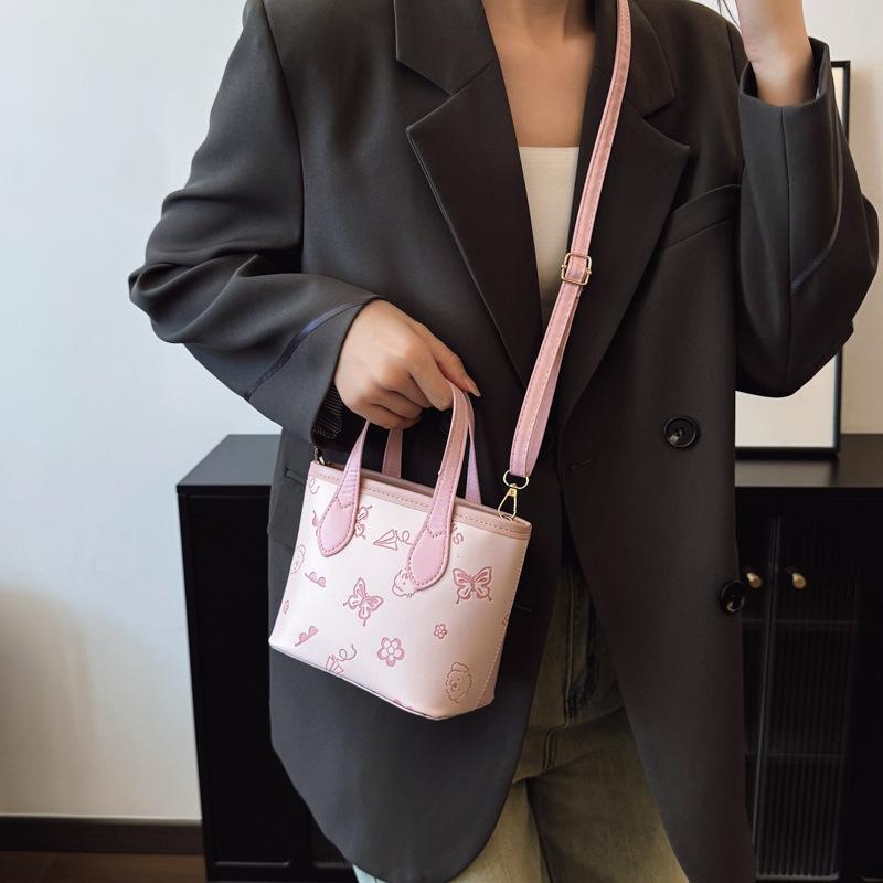 This Year, the Popular Contrasting Color Small Bag Women's 2025 New Versatile Messenger Bag Super Fire Embossed Portable Bucket Bag Wholesale