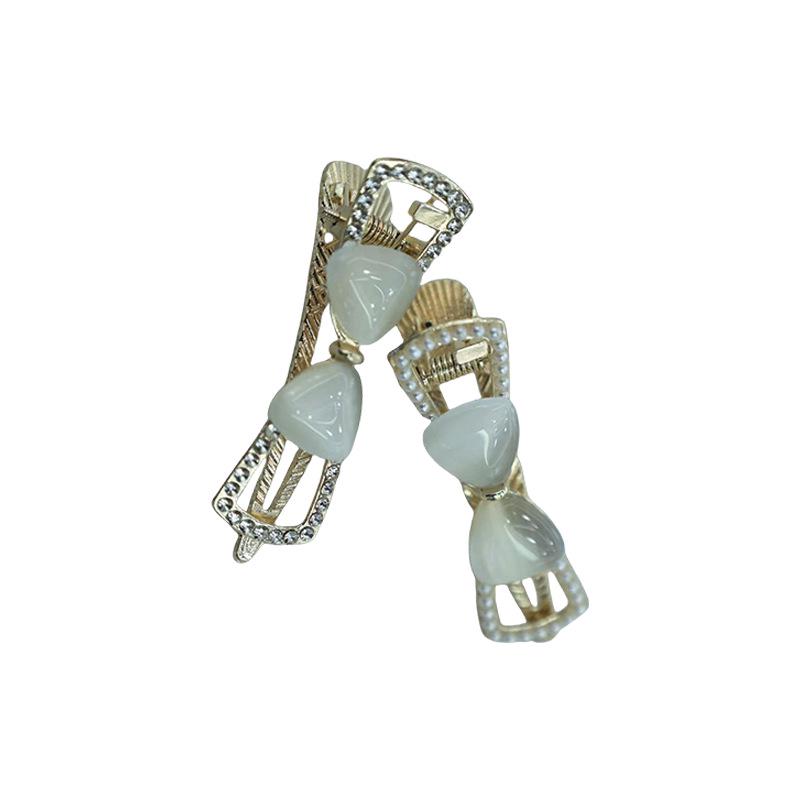 Cremefarbene Katzenaugen Schleife Haarspange - Retro Blume Hohl Damen Krallenclip Kopfschmuck Accessoire