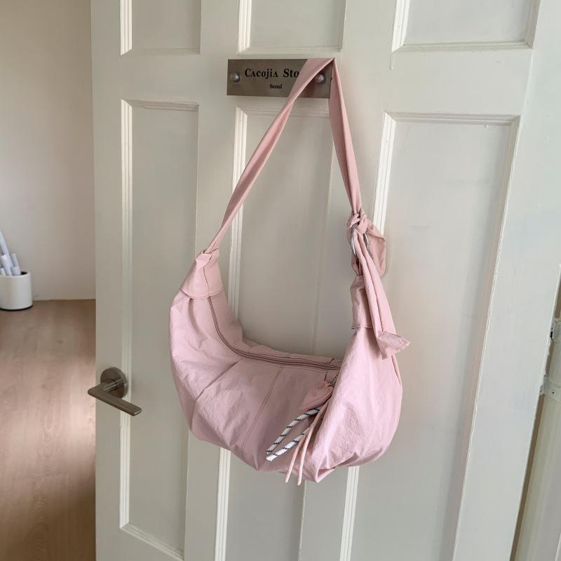 Niche Japanese and Korean literary messenger bag 2025 summer new simple versatile dumpling bag candy-colored casual shoulder bag