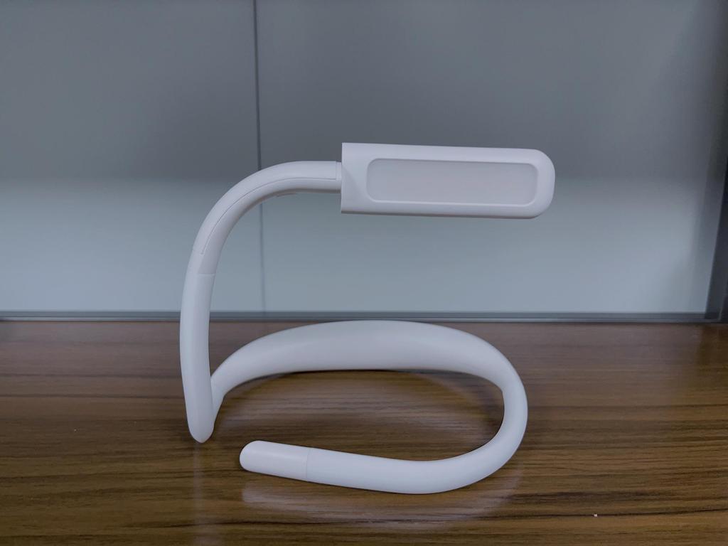 Rechargeable Neck-Hanging LED Reading Light with Eye Protection and Foldable Design for Students and Bedside Use.