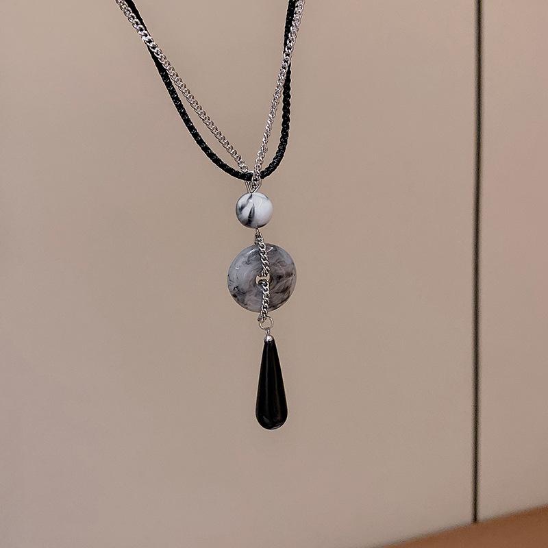 Chinese Retro Peace Buckle Tassel Necklace - High-End Zen Clavicle Chain for Women
