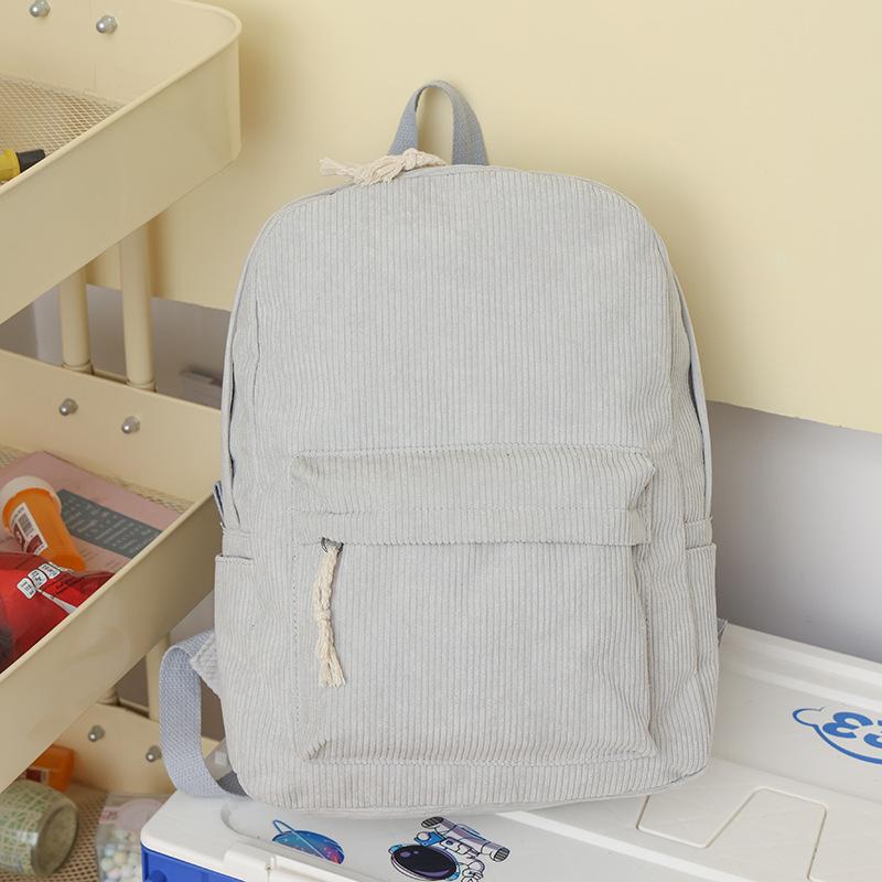 Schoolbag new solid color student schoolbag female corduroy high value large capacity backpack simple college student simple