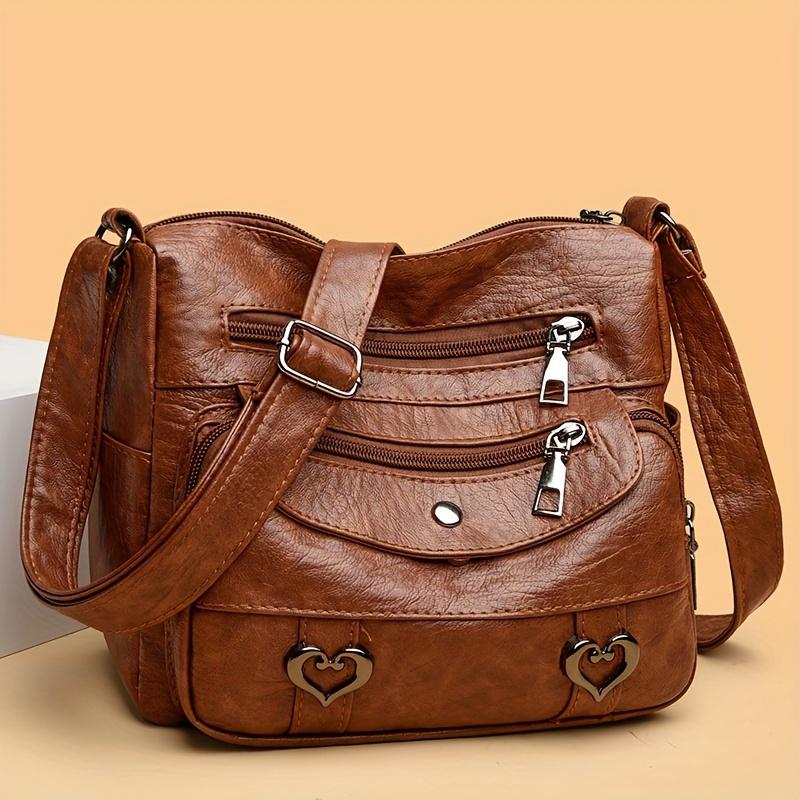 

Модная женская сумка через плечо с подвеской в виде сердца - регулируемый плечевой ремень, несколько карманов, винтажный дизайн чёрный