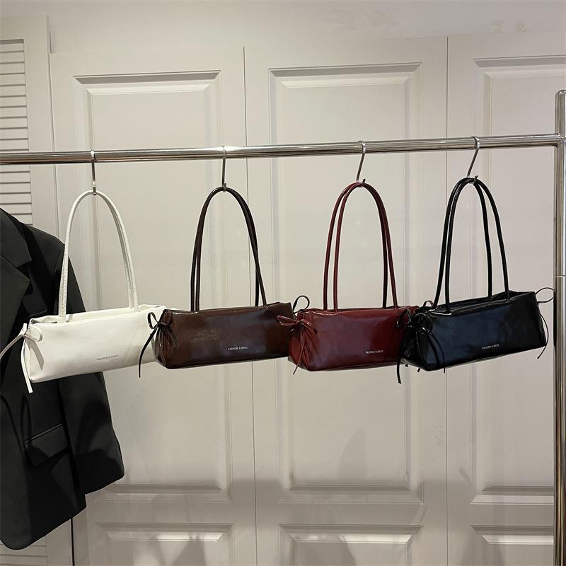 Texturierte Retro-Damen-Neue Schleife Lässig Temperament Modisch Frühling Tragbar Baguette Schulter Achseltasche