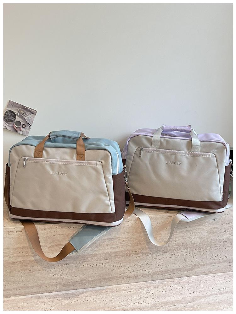 Large Capacity Casual Travel Bag: New Style Lightweight Handheld & Shoulder Luggage Storage for Couples