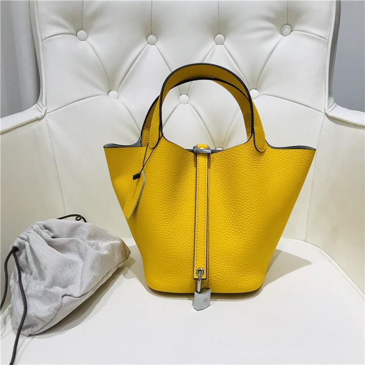 2023 Nowa damska torba ze skóry bydlęcej pierwszej jakości, wzór liczi, koszyk warzywny, worek typu bucket bag, modna i prosta, codzienna torebka