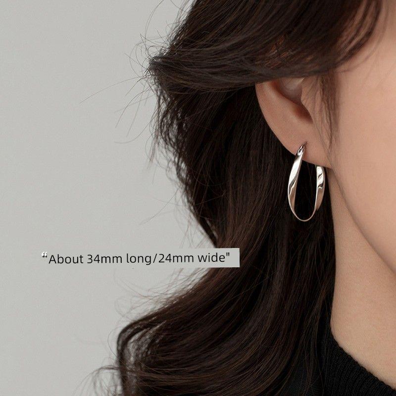 

Xiangnan Mobius Niche Style Best Selling Female 925 Silver Needle 925 silver Mobius earrings (two price)