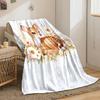 A cute fawn surrounded by delicate flowers and soft pastel foliage. for all seasons blanket lunch break throw gift