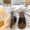 Retro French one-word slippers women's summer wear 2025 new Internet celebrity flat-bottomed seaside vacation sandals casual sandals