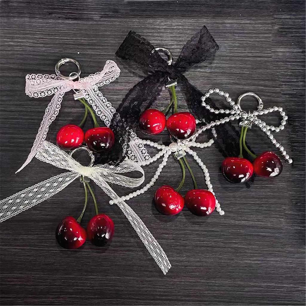 Cherry Pendant Keychain With Bowknot Fashionable Cherry Keychain with Pearlescent Bowknot Accents for Trendsetters