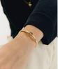 Gaman Unisex Gold Clock Tempus Bangle Bracelet