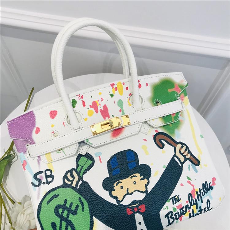2021 New platinum bag first layer cowhide painted spray painting graffiti bag portable shoulder messenger bag personalized women's bag tide