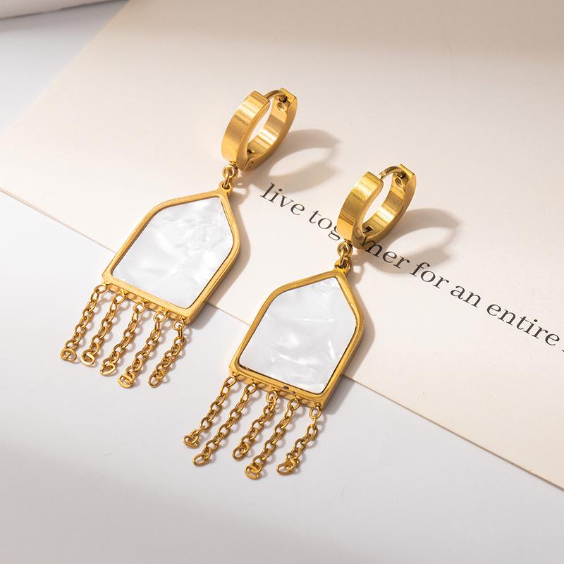 Geometric Hollow Heart Tassel Earrings: Titanium Steel Studs with Light Luxury Design.