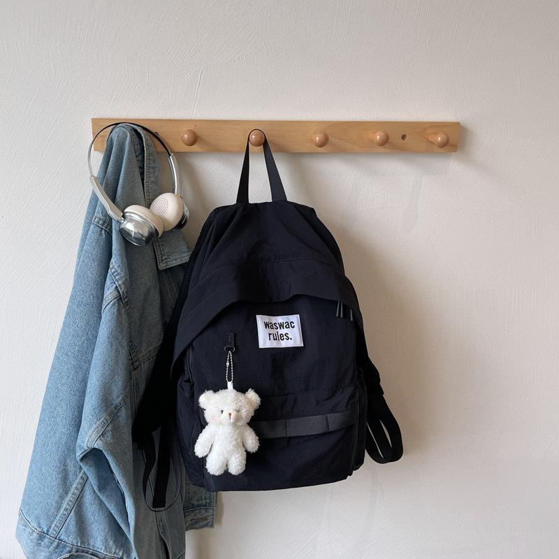 Niche ins style schoolbag female college student Japanese casual large-capacity backpack junior high school student simple design backpack