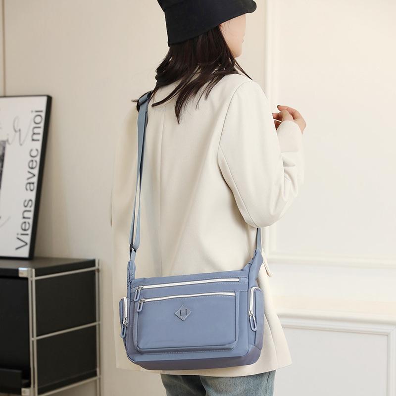 Multi-layer large-capacity shoulder bag women's outdoor leisure anti-splashing messenger bag simple bag