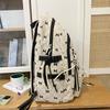 Bow Print Corduroy Backpack Casual Fashion Daily Bag Large Capacity School Bag for Students Minimalist Design Commute Travel with Tassel Accents