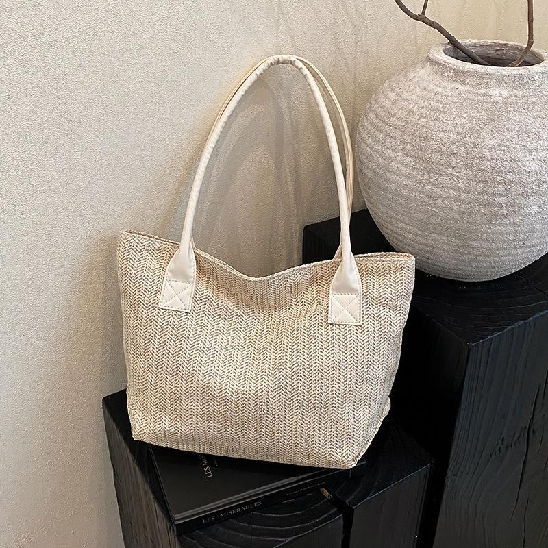 Retro woven contrasting color bucket bag 2025 spring new fashion trend women's shoulder tote bag beach vacation