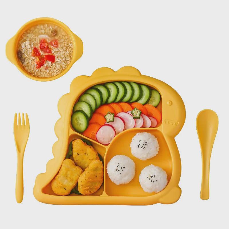 Creative Cartoon Dinosaur Children's Feeding Set: Includes Thickened Plate, Bowl, Spoon, and Fork for Babies and Kindergarten Use.