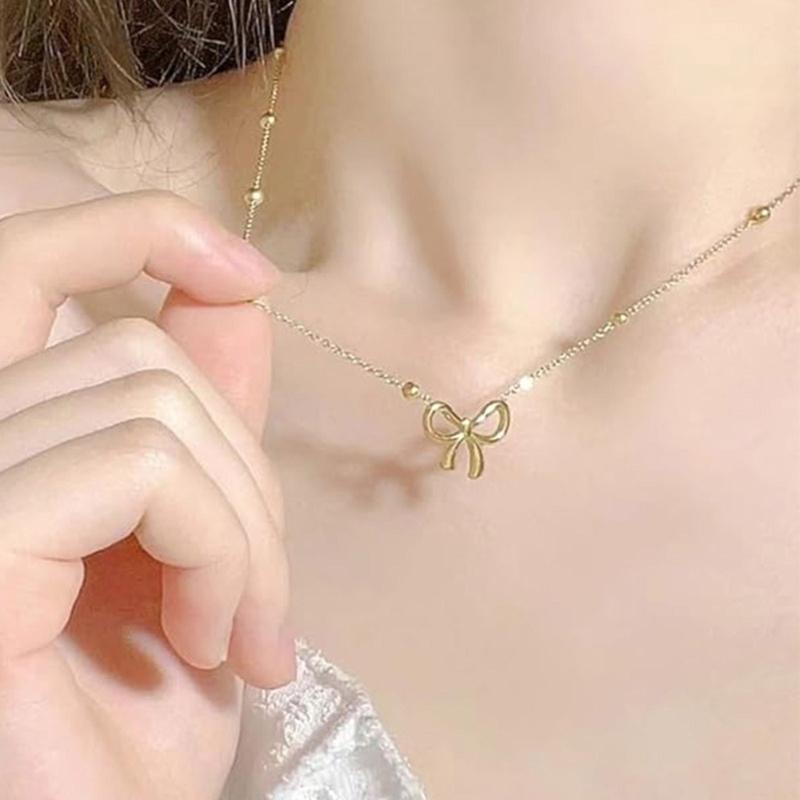 Fashionable Steel Jewelry Set Featuring Butterfly Bowknot Pendant Elegant Necklace And Bracelet For Everyday Wear