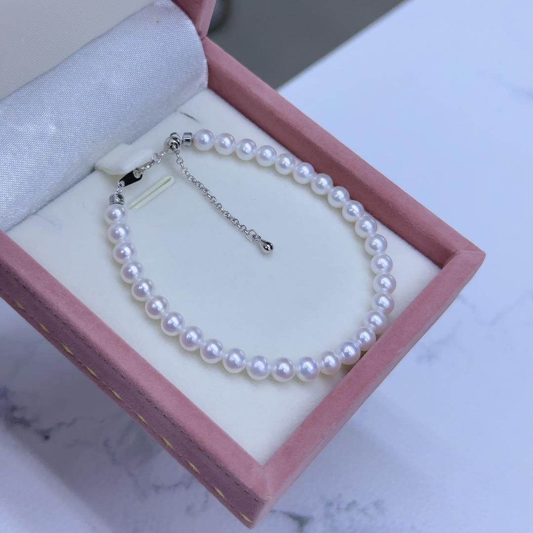 

Elegant Freshwater Pearl Bracelet: Adjustable, High-Luster, Full Round Pearls - Classic, Versatile, and Stackable Fashion Accessory. 16 cm белый